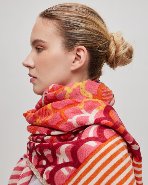 scarf-oange-pink-merino-wool-handcrafted-subtle-relief-chevron-pattern-worn-with-style