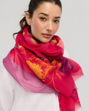 Red floral cotton silk scarf worn around the neck, Princesse & Dragon Montréal