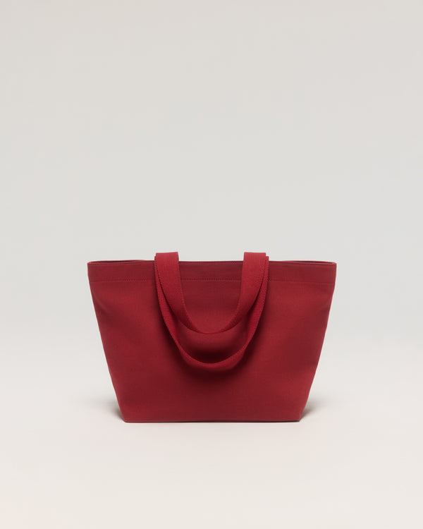 Sac de voyage grand format en canevas de coton rouge brique – Princesse & Dragon Montréal 