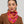 Carré foulard rose orange en coton et soie porté autour du cou, Princesse & Dragon Montréal