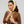 Yellow and white floral square scarf tied around the head, Princesse & Dragon Montréal
