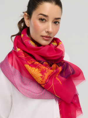 Red floral cotton silk scarf worn around the neck, Princesse & Dragon Montréal