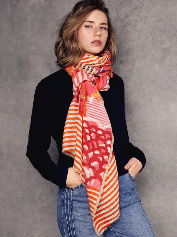 scarf-oange-pink-merino-wool-handcrafted-subtle-relief-chevron-pattern-worn-with-style