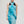 Foulard-turquoise-voile-coton-motif-fleuri-porté-paréo-accessoire-mode-été-élégance